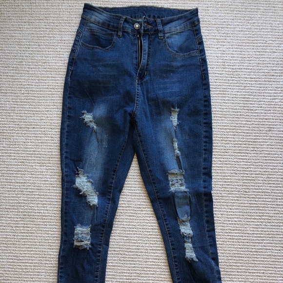 medium wash ripped jeans - Picture 1 of 2